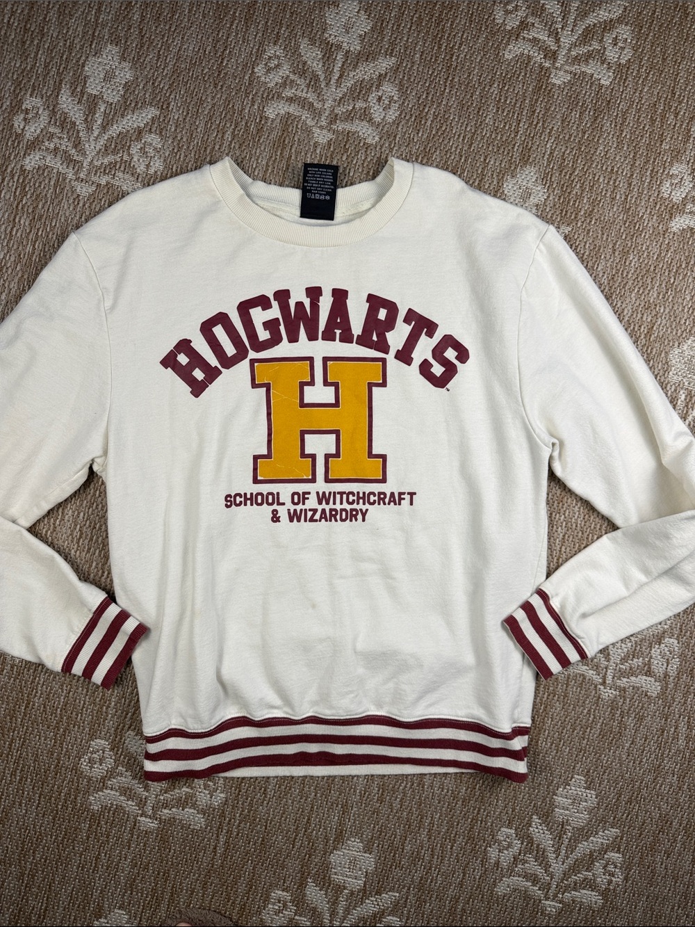 Hogwarts Cream Crewneck Sweatshirt with Maroon & Gold Lettering
